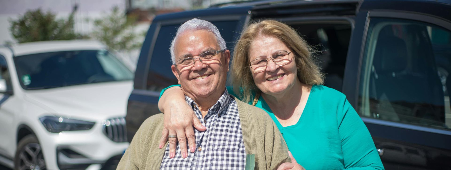 Sienor couple happy after receiving assistance from the Pop In Concierge Service